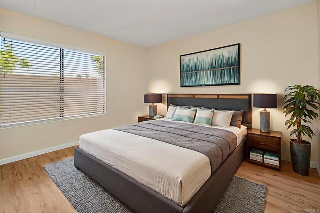 5983 Gaines St, San Diego, CA 92110 - bedroom featuring wood finished floors