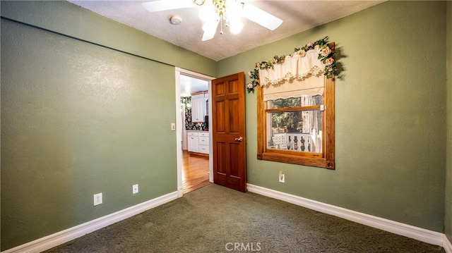 24083 Cresta Dr, Crestline, CA 92325 - spare room with carpet, ceiling fan, and a smoke detector