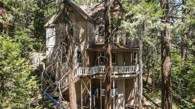 24083 Cresta Dr, Crestline, CA 92325 - view of front of house featuring stairs and a deck