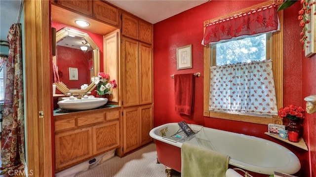 24083 Cresta Dr, Crestline, CA 92325 - bathroom with a freestanding tub and vanity