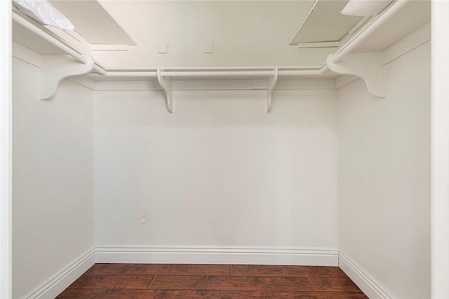 15521 Sandra Ln, Sylmar, CA 91342 - spacious closet featuring dark wood-style flooring