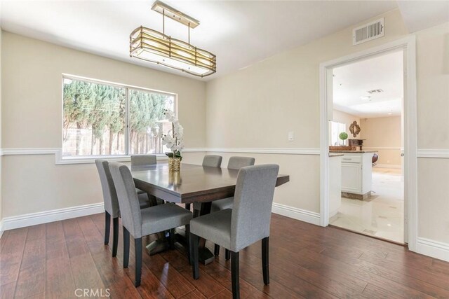 15521 Sandra Ln, Sylmar, CA 91342 - dining room with wood-type flooring and plenty of natural light