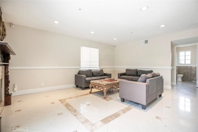 15521 Sandra Ln, Sylmar, CA 91342 - living room featuring recessed lighting and light tile patterned floors