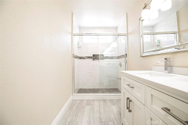 15521 Sandra Ln, Sylmar, CA 91342 - full bathroom featuring vanity, a shower stall, and wood finished floors