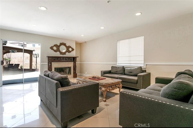 15521 Sandra Ln, Sylmar, CA 91342 - living area with light tile patterned flooring, recessed lighting, and a fireplace