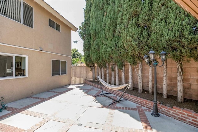 15521 Sandra Ln, Sylmar, CA 91342 - fenced backyard featuring a patio