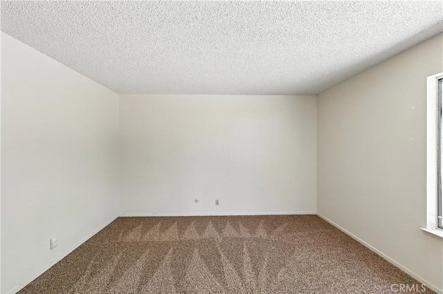 457 Brian Ct, Merced, CA 95348 - additional living space featuring carpet floors and a textured ceiling