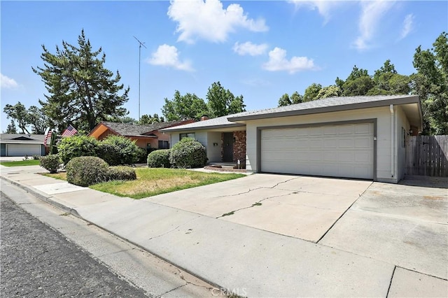 457 Brian Ct, Merced, CA 95348 - single story home with a garage and driveway