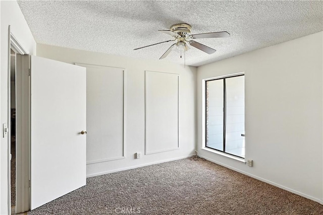 457 Brian Ct, Merced, CA 95348 - unfurnished bedroom featuring a textured ceiling, carpet floors, and ceiling fan