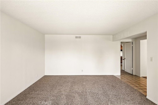 457 Brian Ct, Merced, CA 95348 - unfurnished room with carpet floors and a textured ceiling