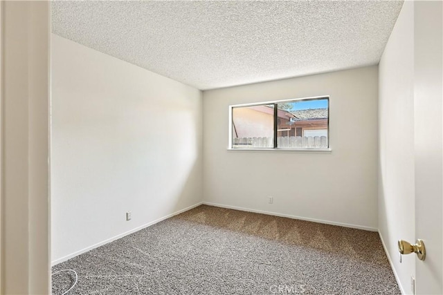 457 Brian Ct, Merced, CA 95348 - unfurnished room featuring carpet and a textured ceiling