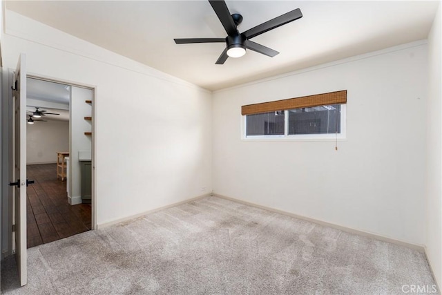 14137 Viburnum Dr, Whittier, CA 90604 - carpeted spare room with a ceiling fan and ornamental molding