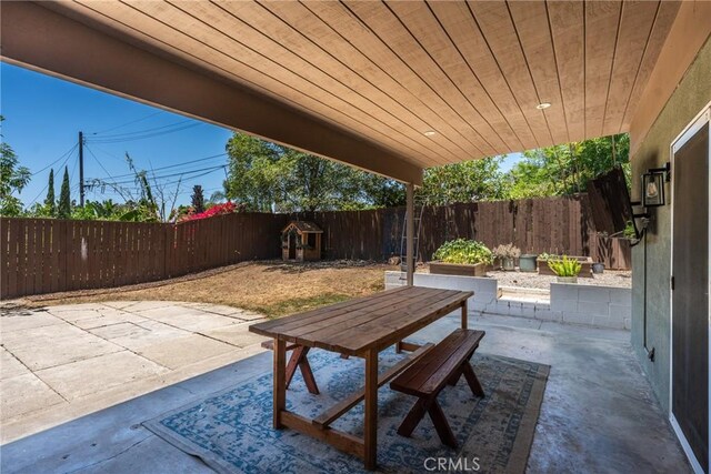 14137 Viburnum Dr, Whittier, CA 90604 - fenced backyard with a patio area and outdoor dining space