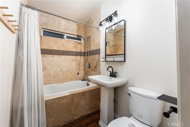 14137 Viburnum Dr, Whittier, CA 90604 - full bath featuring tiled shower / bath combo and toilet