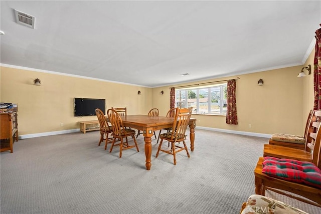 28201 Stallion Springs Dr, Tehachapi, CA 93561 - carpeted dining space featuring ornamental molding and baseboards