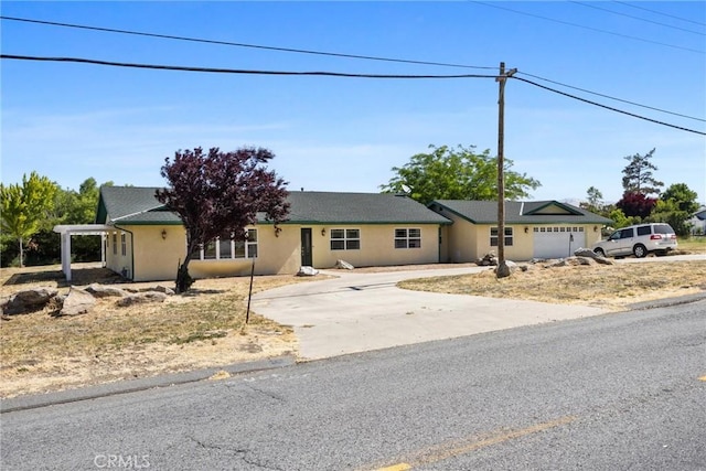28201 Stallion Springs Dr, Tehachapi, CA 93561 - ranch-style home with driveway and stucco siding