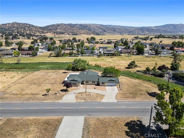 28201 Stallion Springs Dr, Tehachapi, CA 93561 - aerial perspective of suburban area with a mountainous background