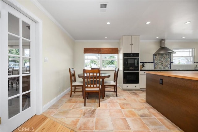 28201 Stallion Springs Dr, Tehachapi, CA 93561 - dining space featuring recessed lighting and ornamental molding