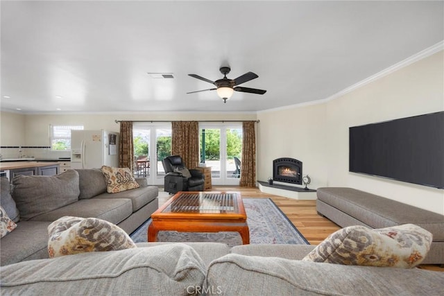 28201 Stallion Springs Dr, Tehachapi, CA 93561 - living area featuring light wood-style flooring, ornamental molding, ceiling fan, and recessed lighting