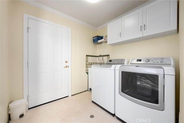 28201 Stallion Springs Dr, Tehachapi, CA 93561 - laundry area featuring cabinet space, separate washer and dryer, crown molding, and light tile patterned floors