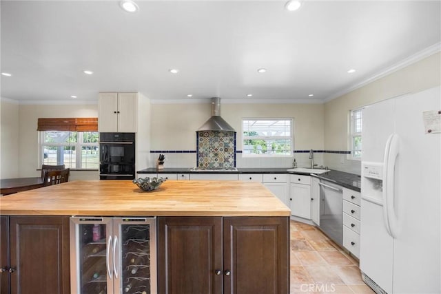 28201 Stallion Springs Dr, Tehachapi, CA 93561 - kitchen featuring white fridge with ice dispenser, stainless steel dishwasher, wine cooler, wooden counters, and wall chimney range hood