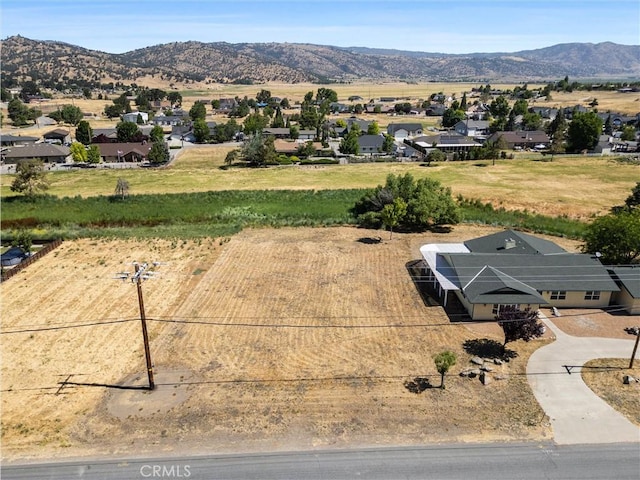 28201 Stallion Springs Dr, Tehachapi, CA 93561 - aerial perspective of suburban area with a mountain backdrop