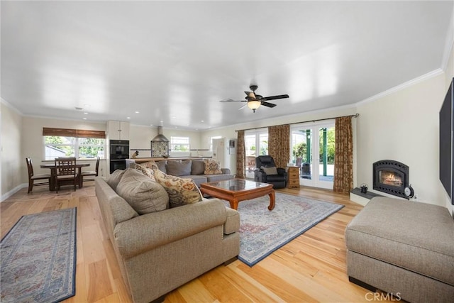 28201 Stallion Springs Dr, Tehachapi, CA 93561 - living room featuring plenty of natural light, ornamental molding, ceiling fan, light wood-style floors, and recessed lighting