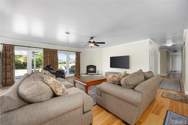 28201 Stallion Springs Dr, Tehachapi, CA 93561 - living room with light wood-style floors, crown molding, and ceiling fan