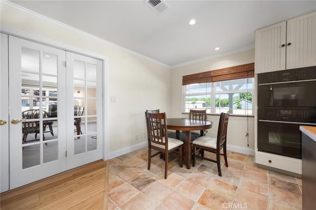 28201 Stallion Springs Dr, Tehachapi, CA 93561 - dining area featuring crown molding, recessed lighting, and light stone finish floors