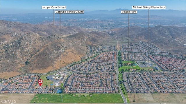 15965 Peach Tree Ln, Fontana, CA 92337 - aerial overview of property's location with mountains