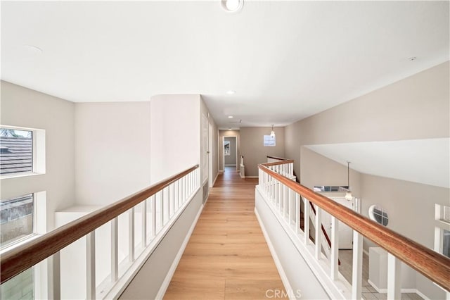 15965 Peach Tree Ln, Fontana, CA 92337 - hallway with an upstairs landing, recessed lighting, and light wood-style floors
