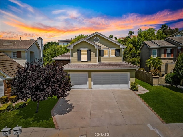 2311 Gillingham Cir, Thousand Oaks, CA 91362 - traditional home with an attached garage, concrete driveway, and a yard