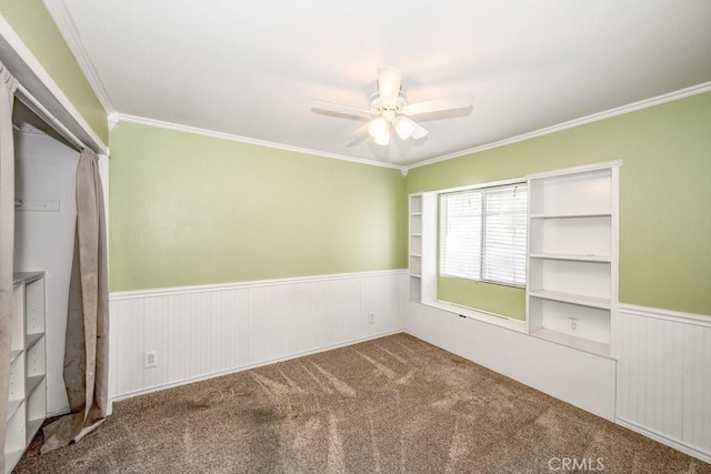 27625 Primrose Ln, Castaic, CA 91384 - carpeted spare room with wainscoting, crown molding, and ceiling fan
