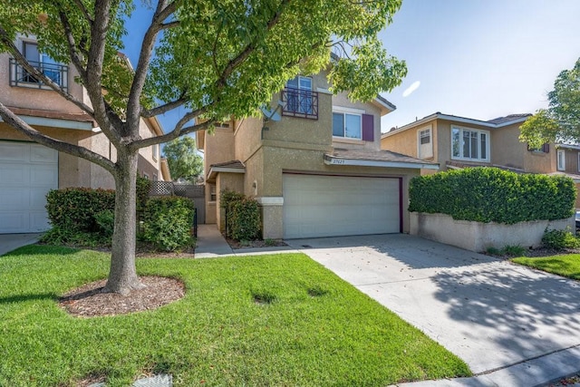 27625 Primrose Ln, Castaic, CA 91384 - traditional-style house with stucco siding, a garage, driveway, and a front lawn
