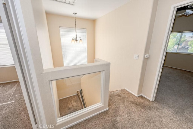 27625 Primrose Ln, Castaic, CA 91384 - hall featuring carpet, an upstairs landing, and attic access