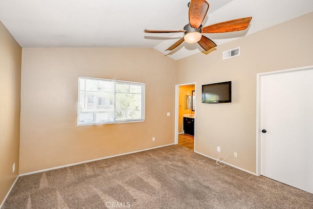 27625 Primrose Ln, Castaic, CA 91384 - unfurnished bedroom with carpet, vaulted ceiling, connected bathroom, and a ceiling fan