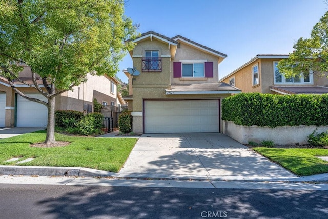27625 Primrose Ln, Castaic, CA 91384 - traditional-style home with stucco siding, an attached garage, concrete driveway, and a tile roof