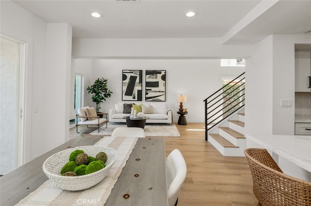 22627 Lakeside Ln, Lake Forest, CA 92630 - living area featuring light wood-style floors, stairway, and recessed lighting