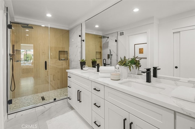 22627 Lakeside Ln, Lake Forest, CA 92630 - full bath with double vanity, recessed lighting, marble look tile flooring, and a shower stall