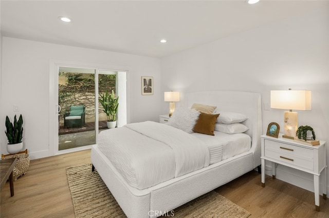 22627 Lakeside Ln, Lake Forest, CA 92630 - bedroom with access to exterior, light wood-style floors, and recessed lighting