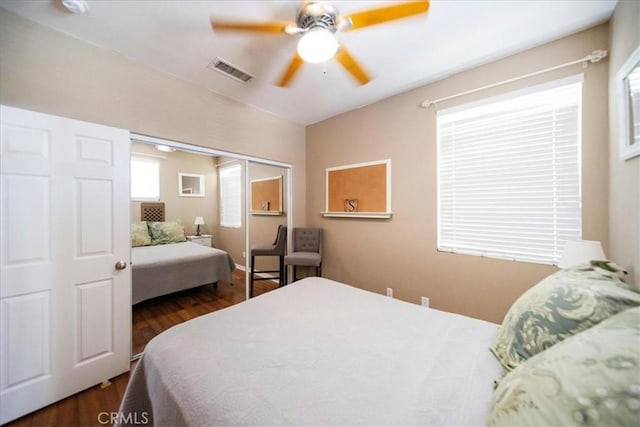 42365 Westar Ct, Murrieta, CA 92562 - bedroom featuring dark wood-style floors, a closet, and ceiling fan