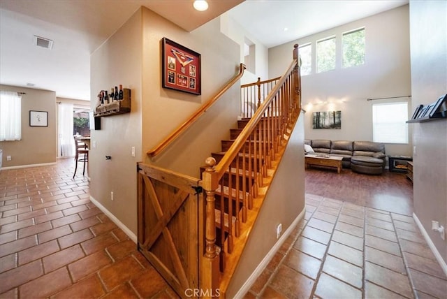 42365 Westar Ct, Murrieta, CA 92562 - staircase featuring baseboards
