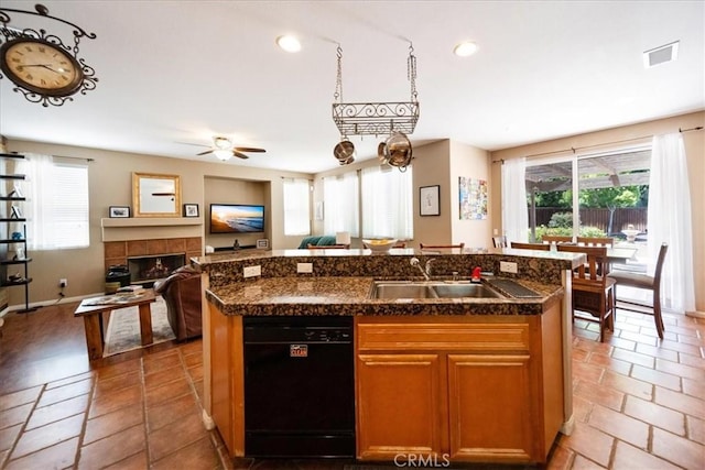 42365 Westar Ct, Murrieta, CA 92562 - kitchen featuring dishwasher, plenty of natural light, open floor plan, a kitchen island with sink, and recessed lighting