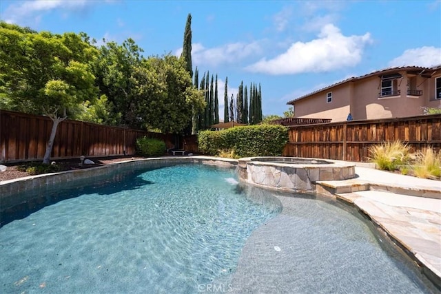 42365 Westar Ct, Murrieta, CA 92562 - view of swimming pool featuring a fenced backyard, a pool with connected hot tub, and a patio area