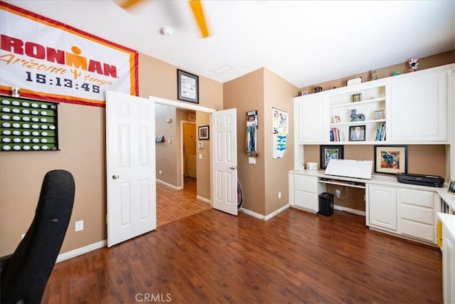 42365 Westar Ct, Murrieta, CA 92562 - office featuring dark wood-style floors and built in desk