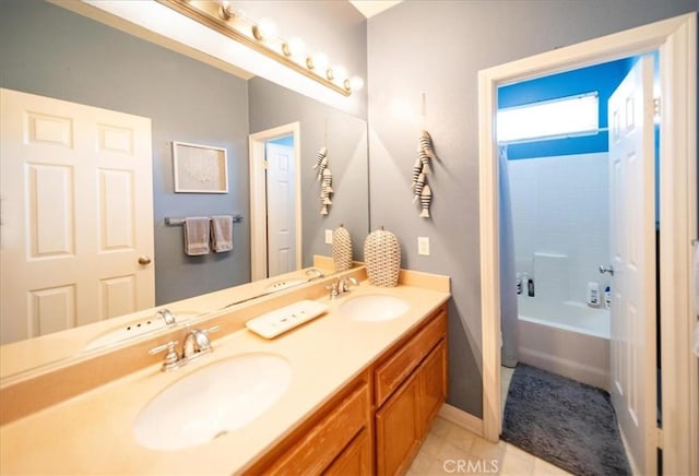 42365 Westar Ct, Murrieta, CA 92562 - bathroom with double vanity, shower / bath combo with shower curtain, and tile patterned floors