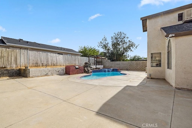 2134 Moonlight Ct, Palmdale, CA 93550 - view of pool featuring a fenced backyard, a patio area, and a pool with connected hot tub