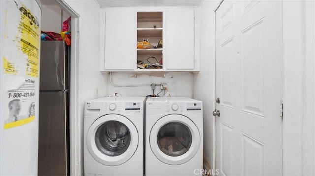 533 E Fredricks St, Barstow, CA 92311 - laundry area with cabinet space and washer and dryer