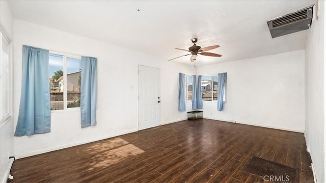 533 E Fredricks St, Barstow, CA 92311 - spare room with wood finished floors, a ceiling fan, and healthy amount of natural light