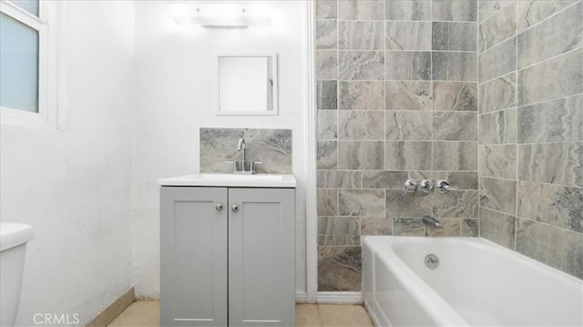 533 E Fredricks St, Barstow, CA 92311 - full bath with vanity, tile patterned flooring, and tub / shower combination